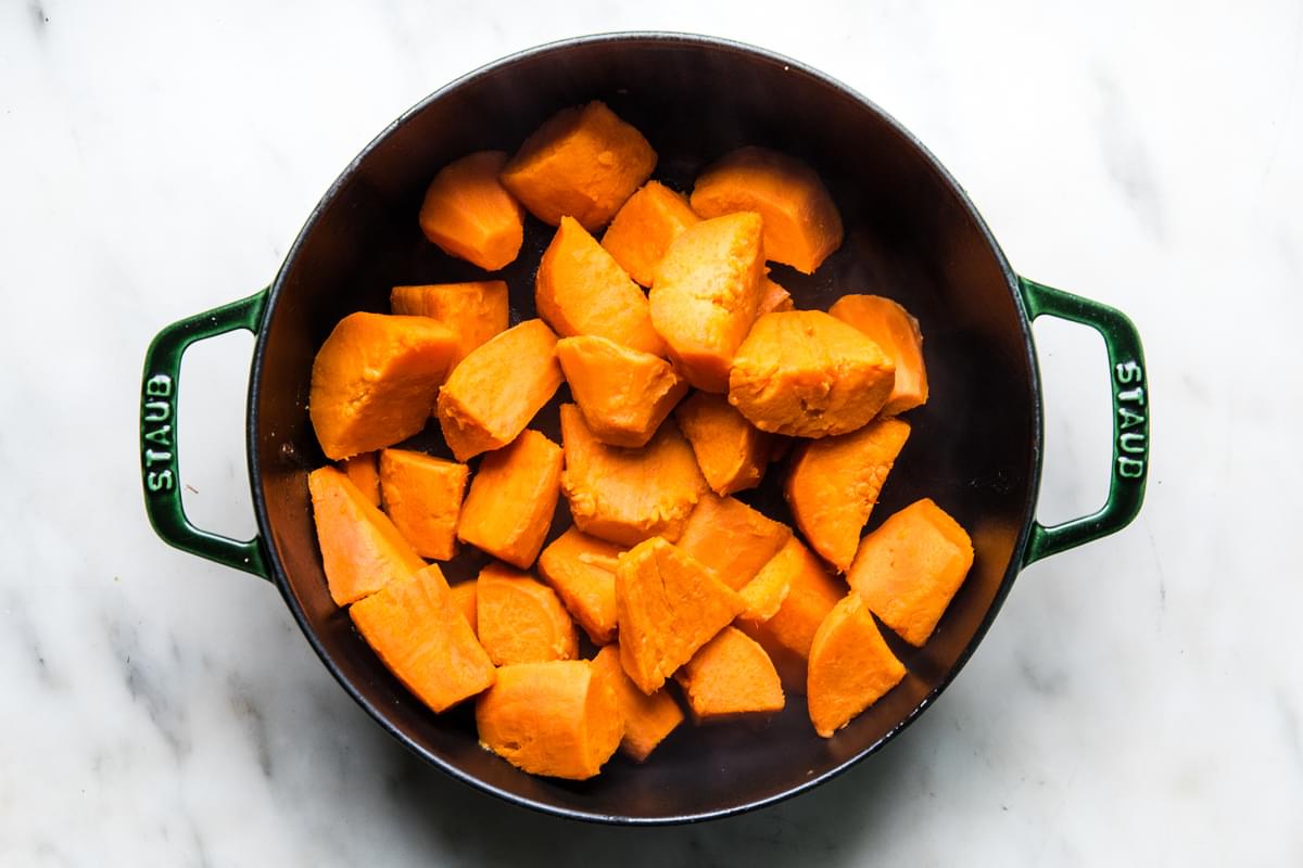 cubed cooked sweet potatoes in a large pot