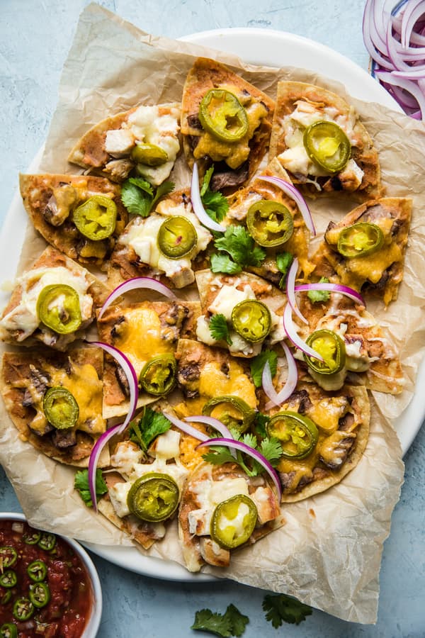 Texas Style Nachos with steak an chicken, cheese and jalapeño