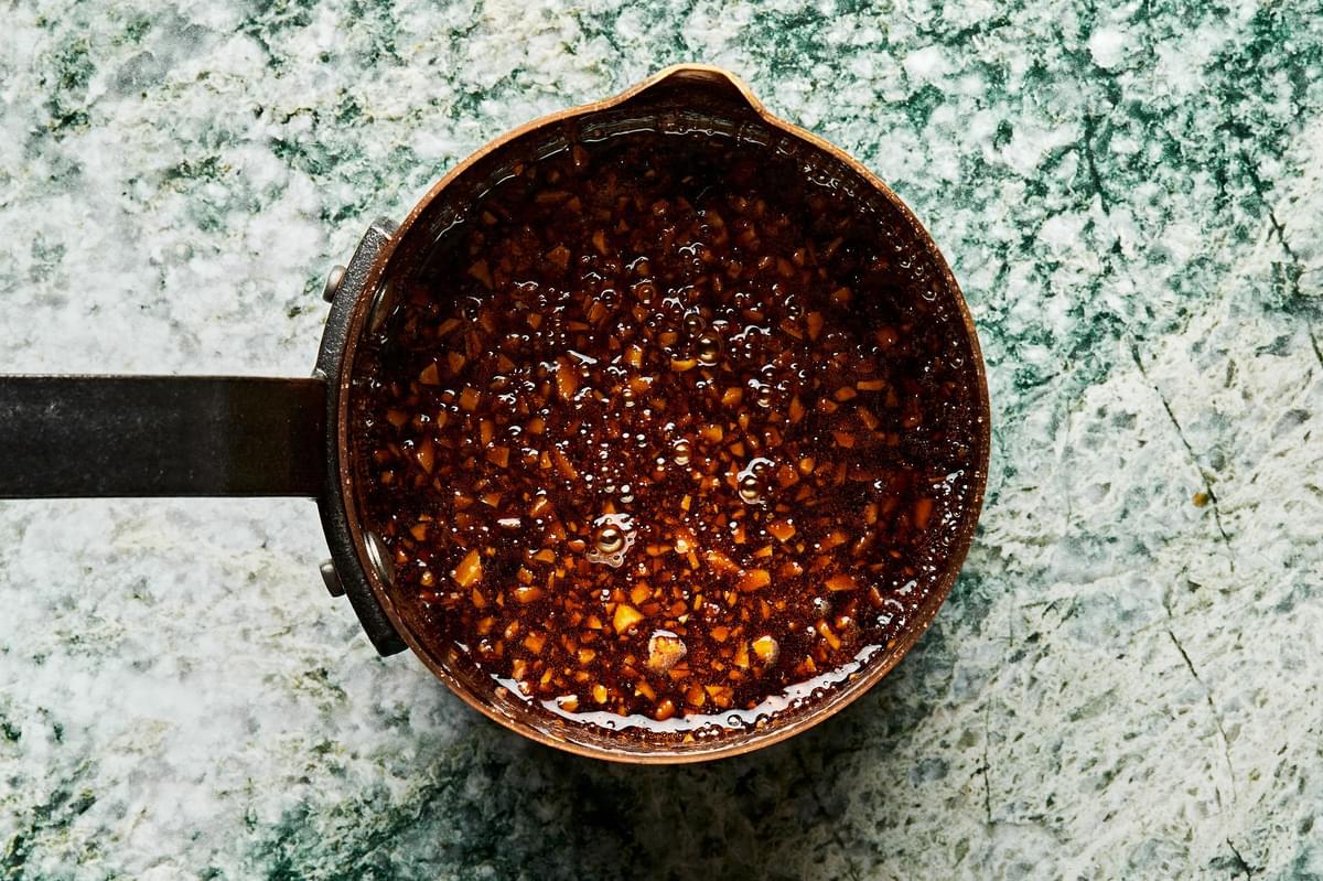 brown sugar, soy sauce , rice vinegar, sriracha, sesame oil, ginger & garlic in a pot for Sriracha-Brown Sugar Sauce
