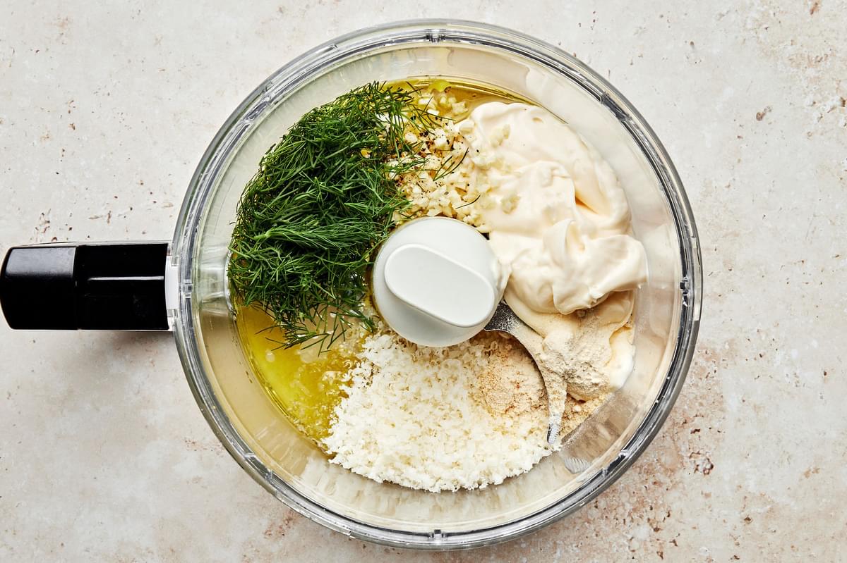 olive oil, mayo, garlic, dill, garlic powder, onion powder, lemon juice, Parmesan, salt and pepper in a food processor