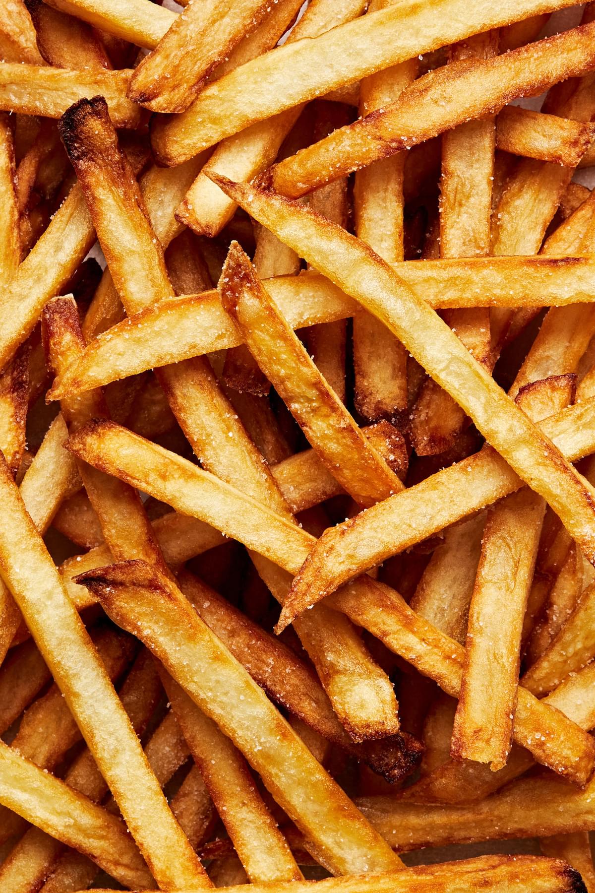 crispy, golden homemade French fries seasoned with salt and pepper