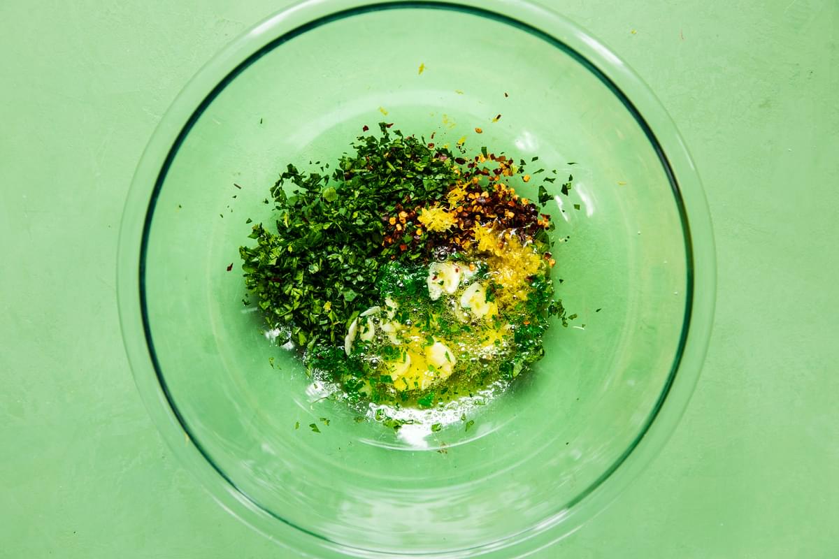 garlic, parsley, lemon zest, red pepper flakes, salt, butter and olive oil in a bowl for linguine with lemon garlic sauce