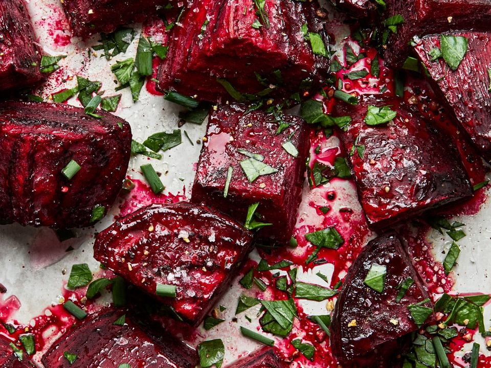 roasted beets tossed with olive oil & salt, roasted until tender then tossed with vinegar, herbs & pepper for serving