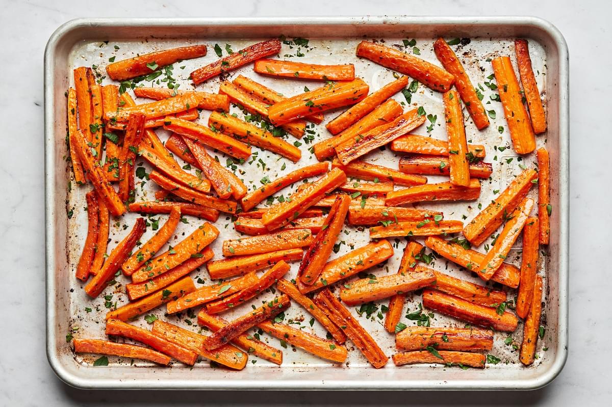 carrots tossed in olive oil, salt, pepper and garlic pepper then roasted in the oven and sprinkled with parsley
