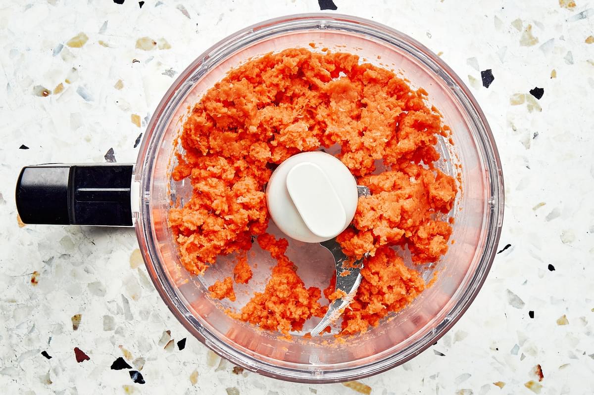 salmon in a food processor that has been pulsed into small 1/8 inch pieces