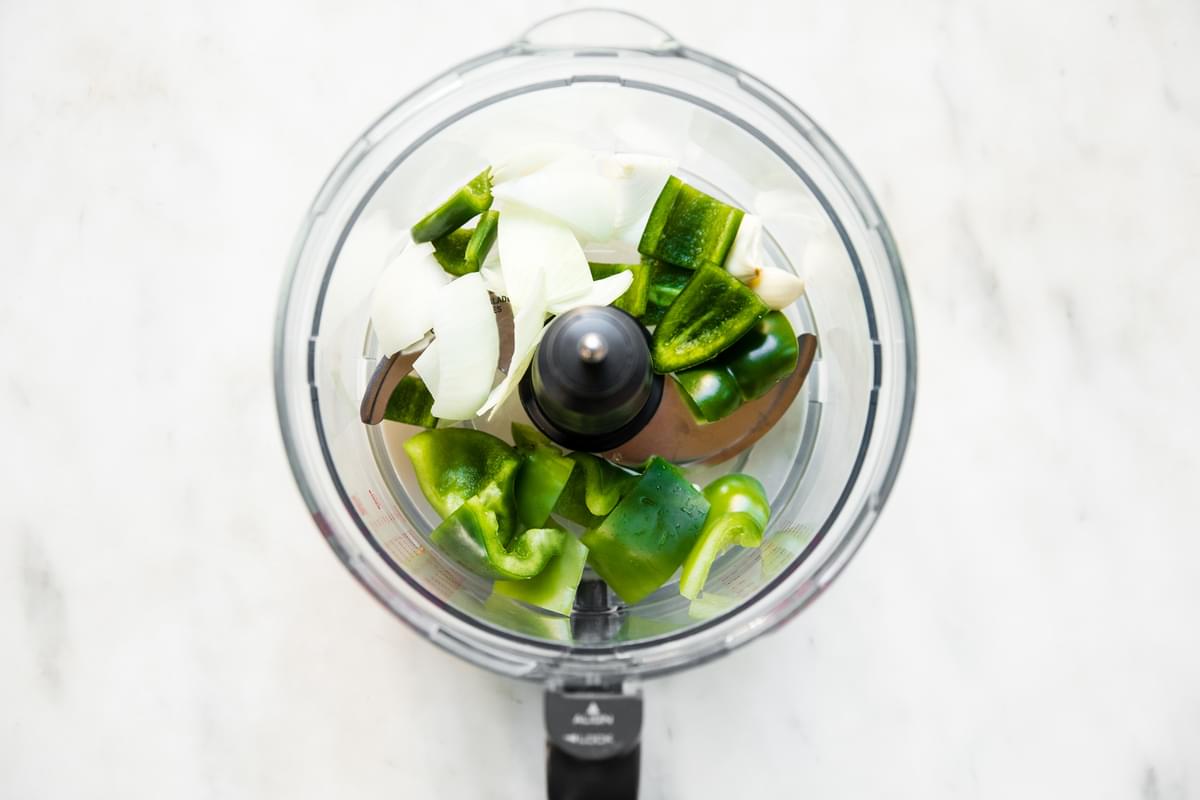 jalapeno, onion and green bell peppers in a food processor