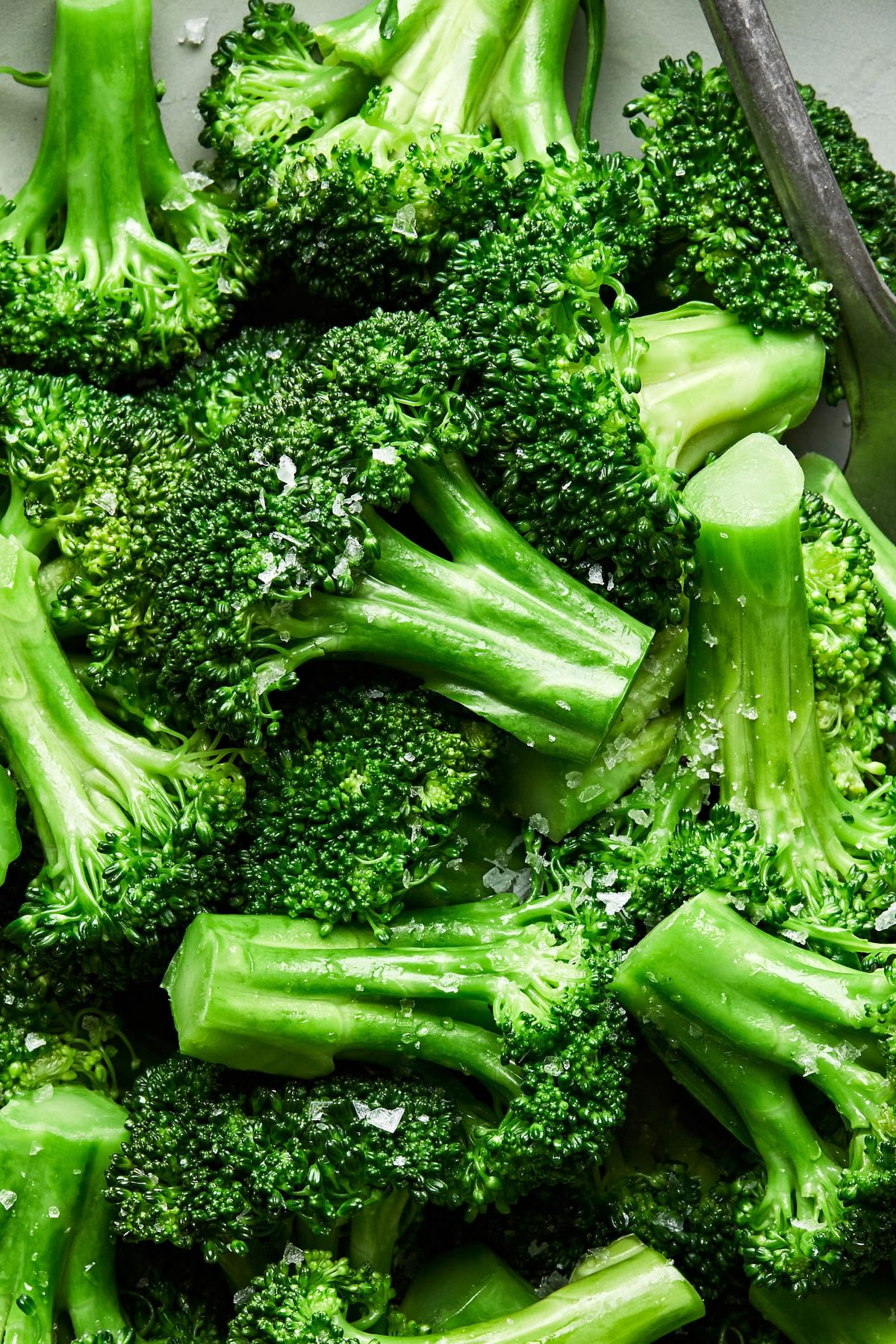 homemade steamed broccoli seasoned with salt