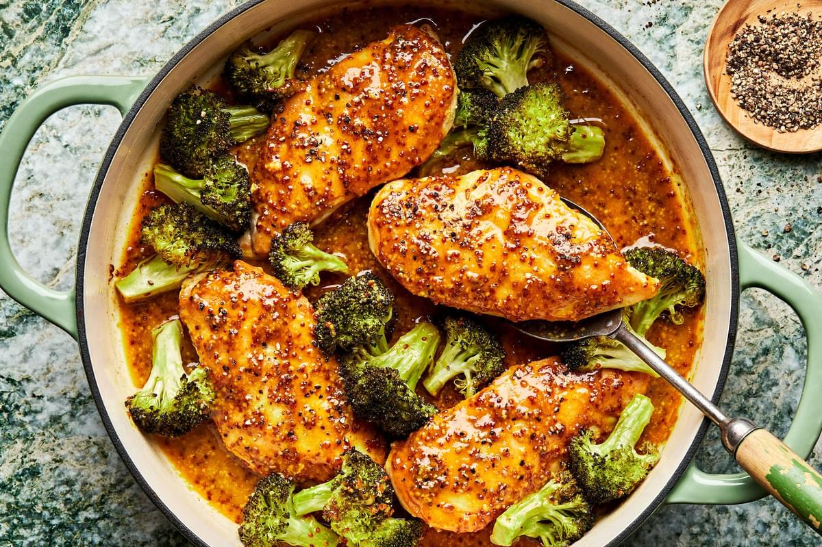 honey mustard curry chicken with broccoli in a skillet