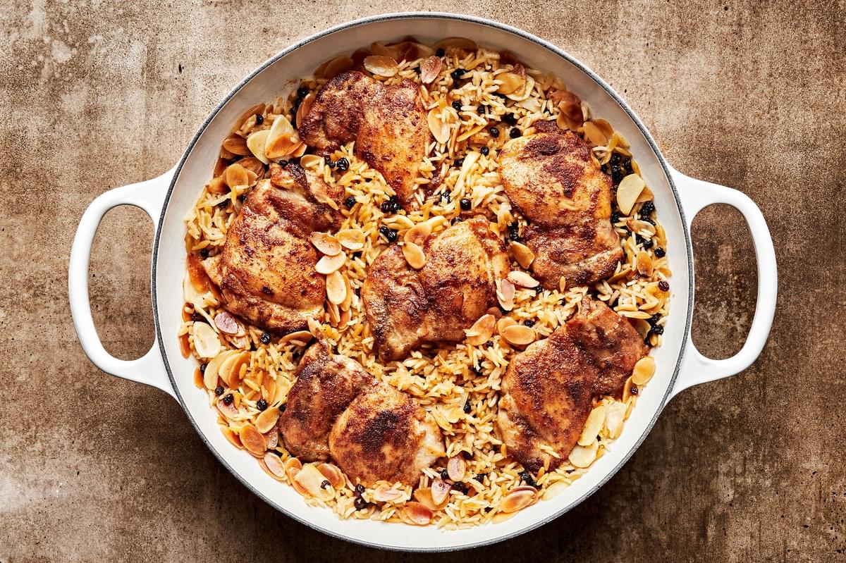Almond and Currant Pilaf with Chicken in a skillet