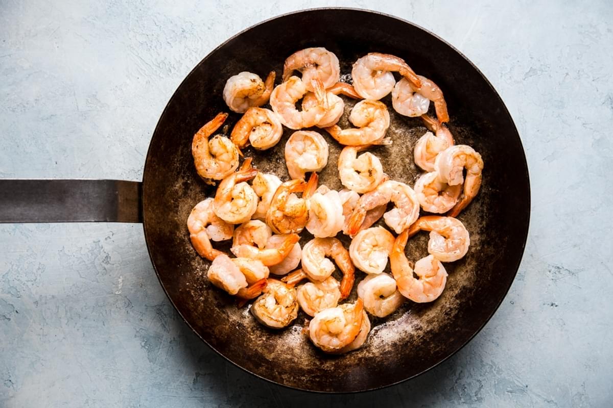 cooked shrimp in a sauce pan