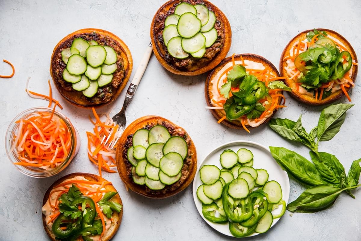 open face pork banh mi burgers with basil, cucumbers and pickled carrots