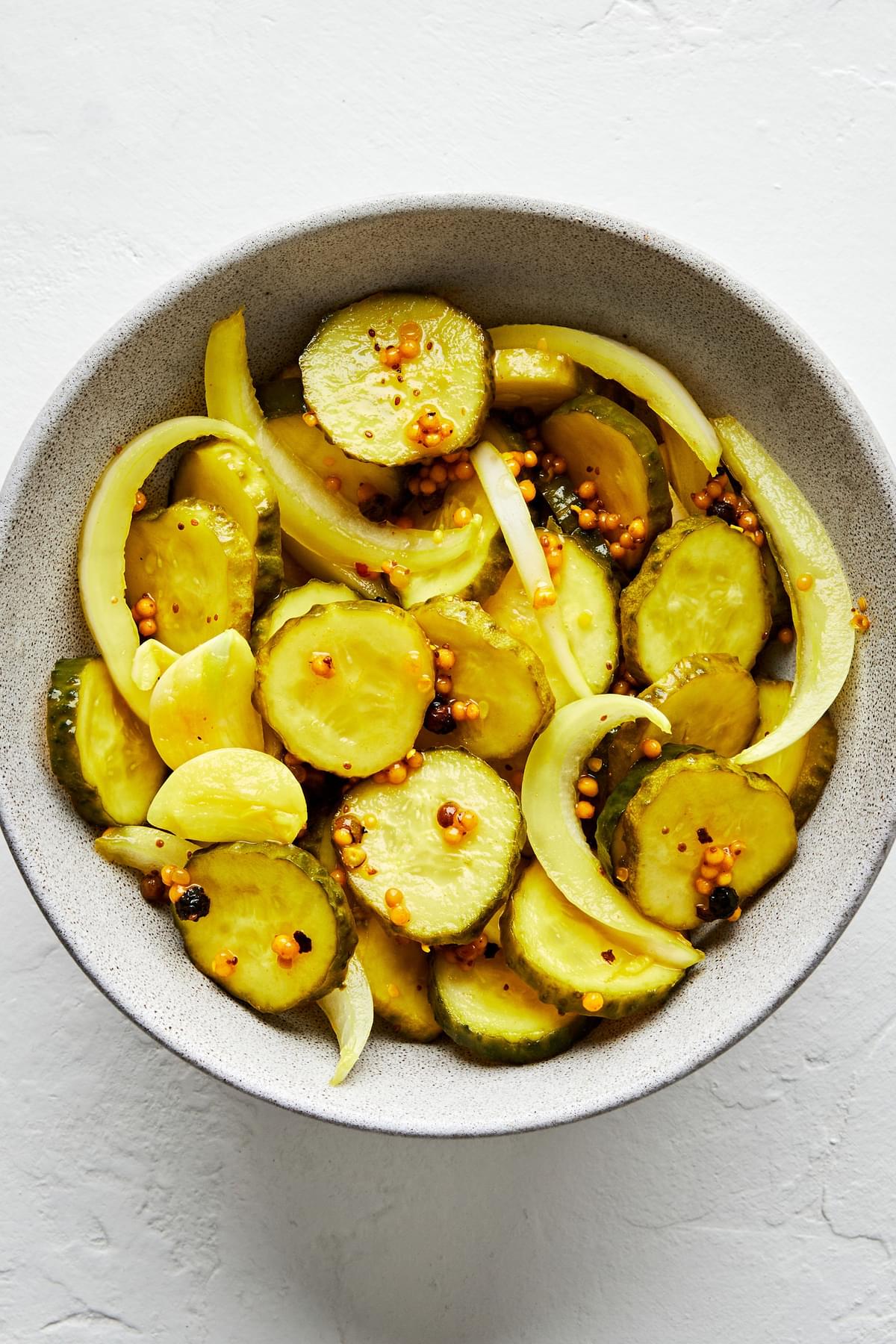 homemade bread and butter pickles in a bowl