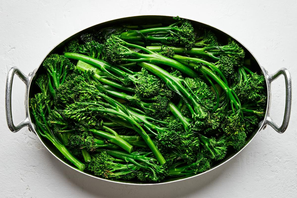roasted broccolini in a casserole dish