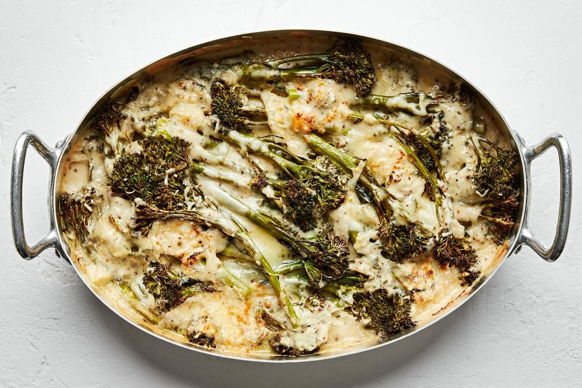 baked broccolini au gratin in a casserole dish