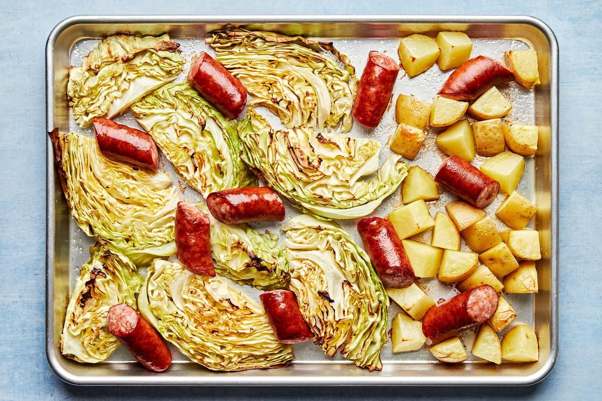 cabbage, sausage and potatoes roasted on a sheet pan