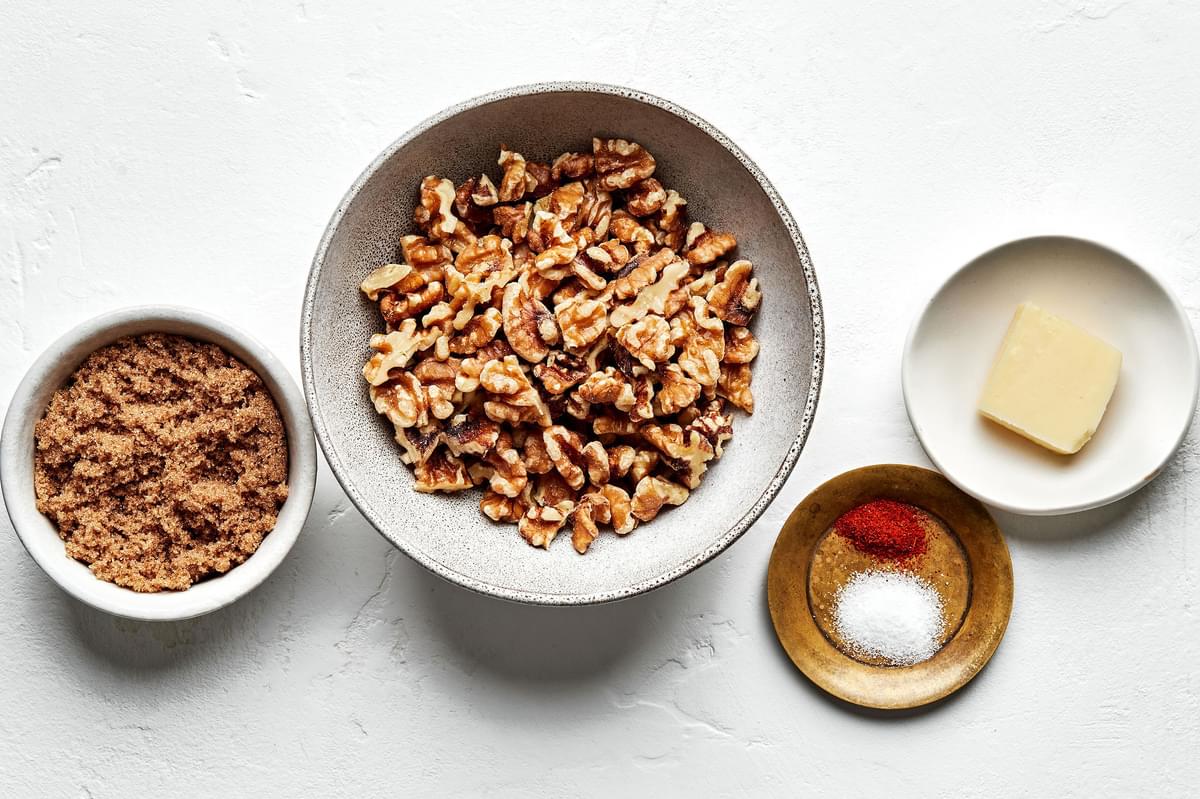 walnuts, brown sugar, butter, salt and cayenne in bowls to make candied walnuts