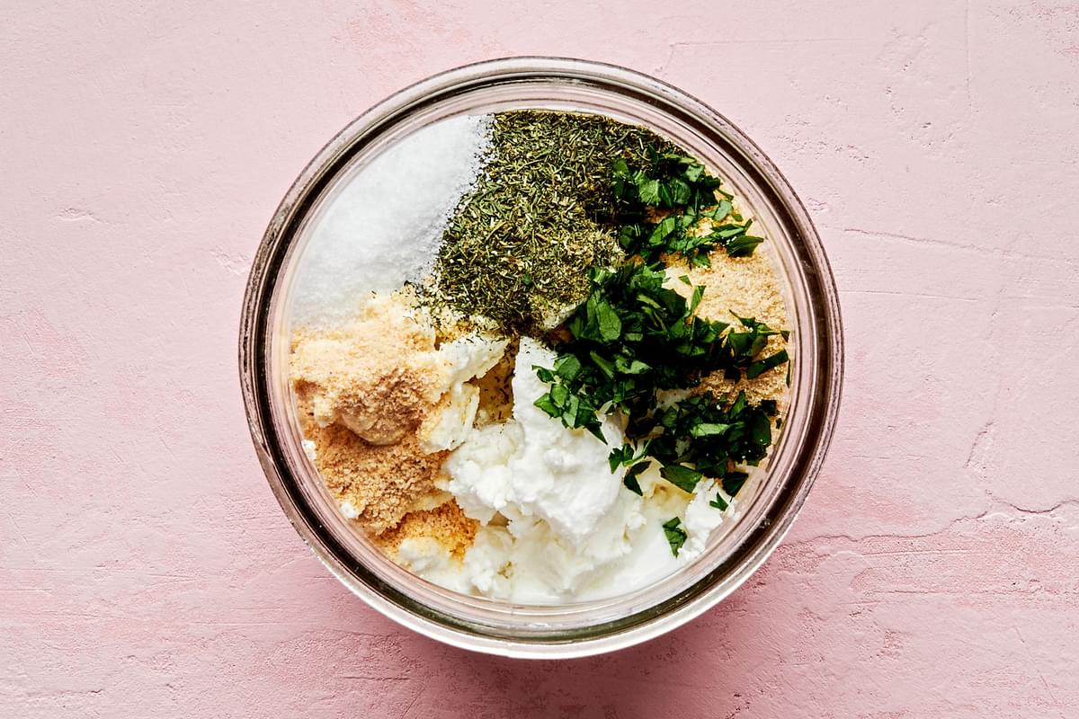 buttermilk, mayonnaise, yogurt, chèvre, parsley, onion powder, garlic powder, dill, and salt in a large jar