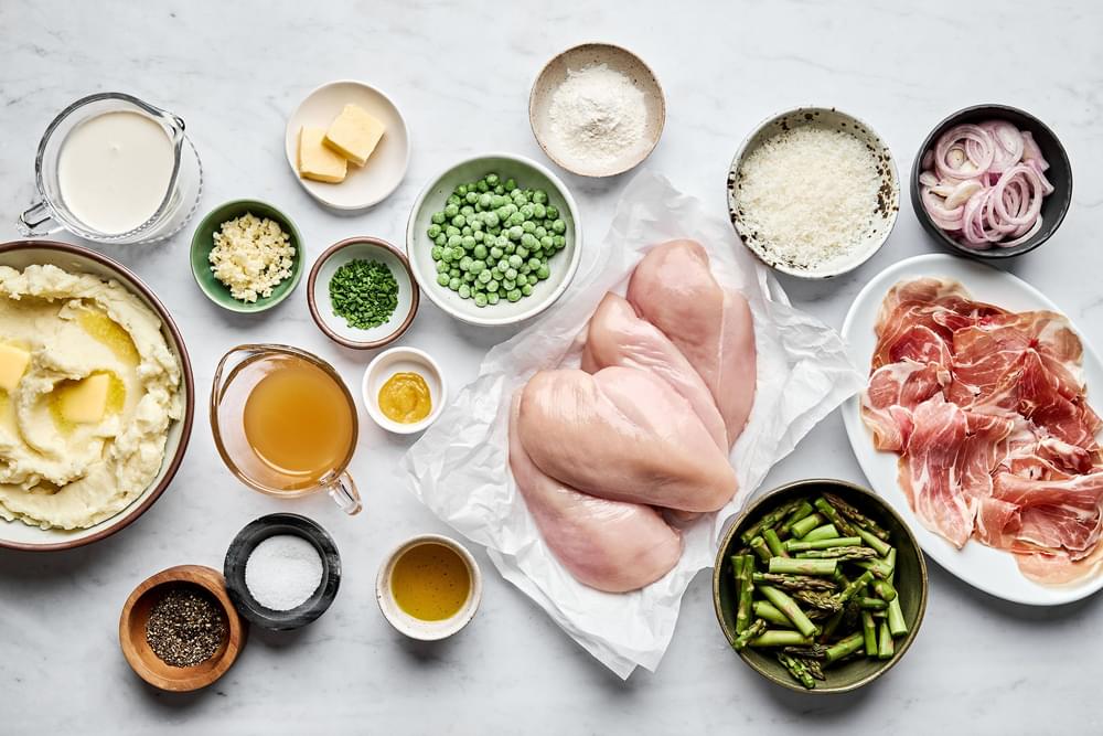 prosciutto, chicken, shallot, garlic, cream, stock, Parm, asparagus, peas, chives, butter, spices & flour in prep bowls