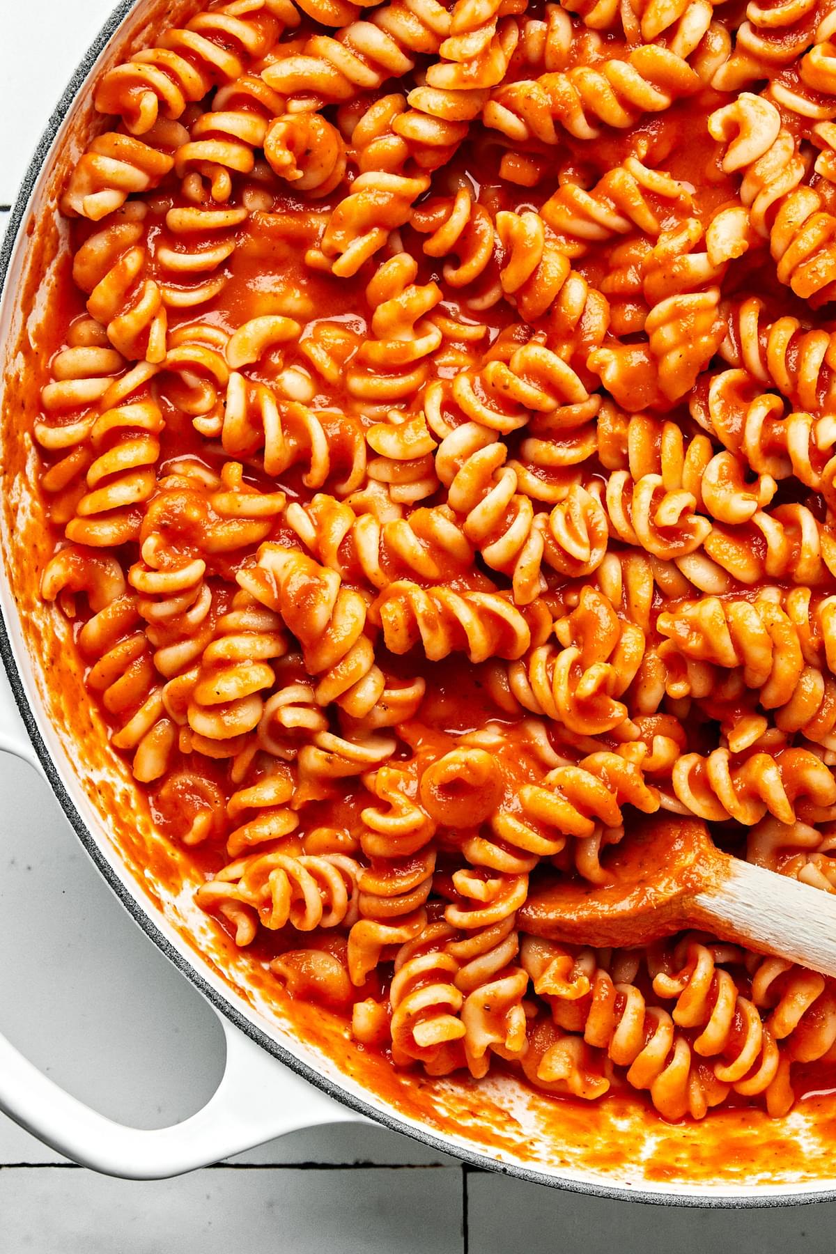 a pot of Fussili Pasta with Spicy Tomato Sauce made with san marzano tomatoes butter, Italian seasoning and red pepper flakes