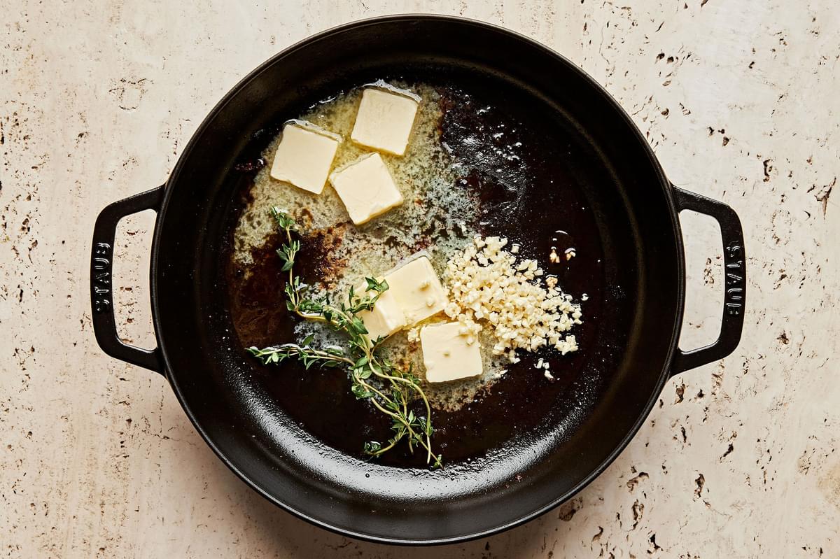 butter, garlic and thyme in a skillet