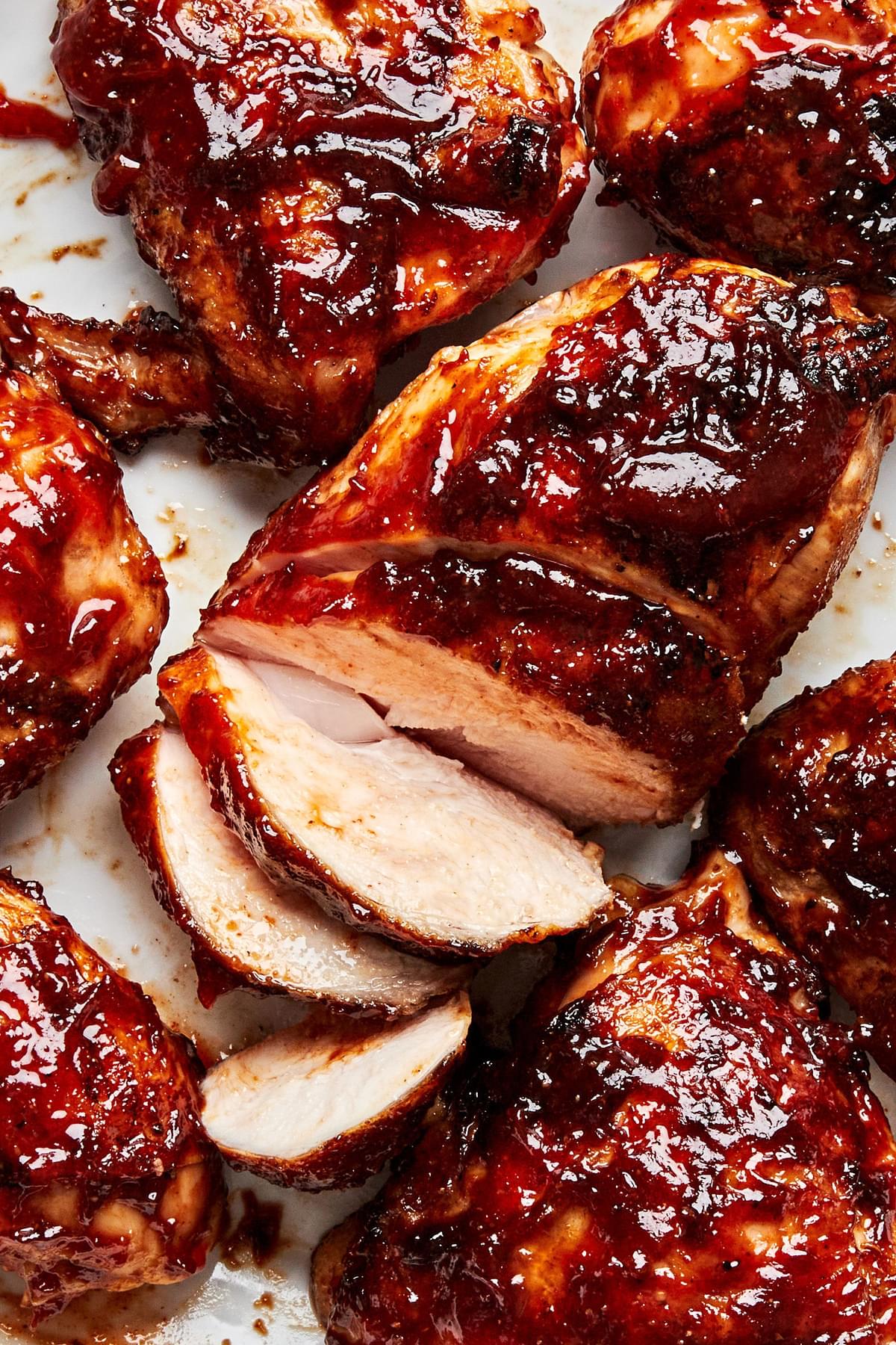 sliced grilled bbq chicken smothered in bbq sauce