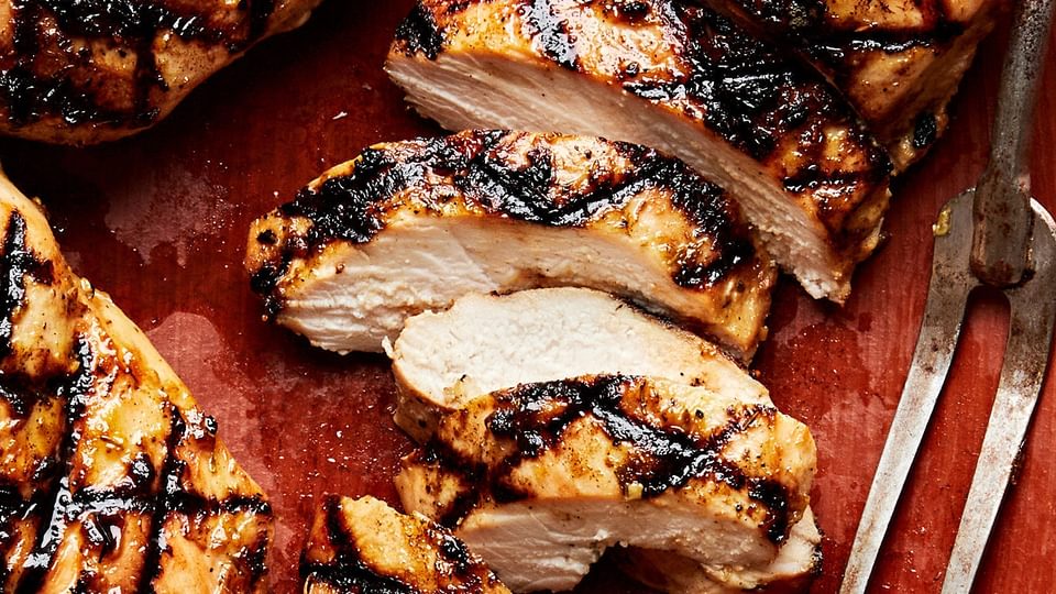 grilled chicken sliced on a serving platter