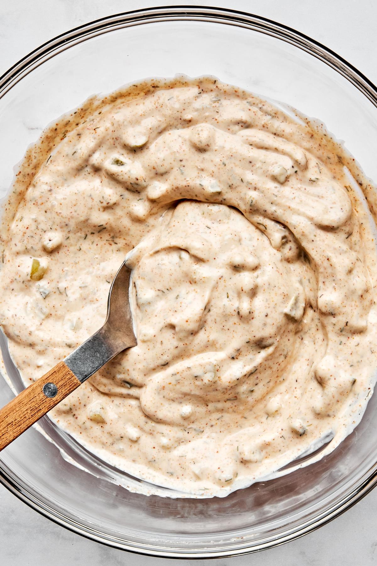 tartar sauce in a bowl made with mayo, pickles, lemon juice, sugar and spices