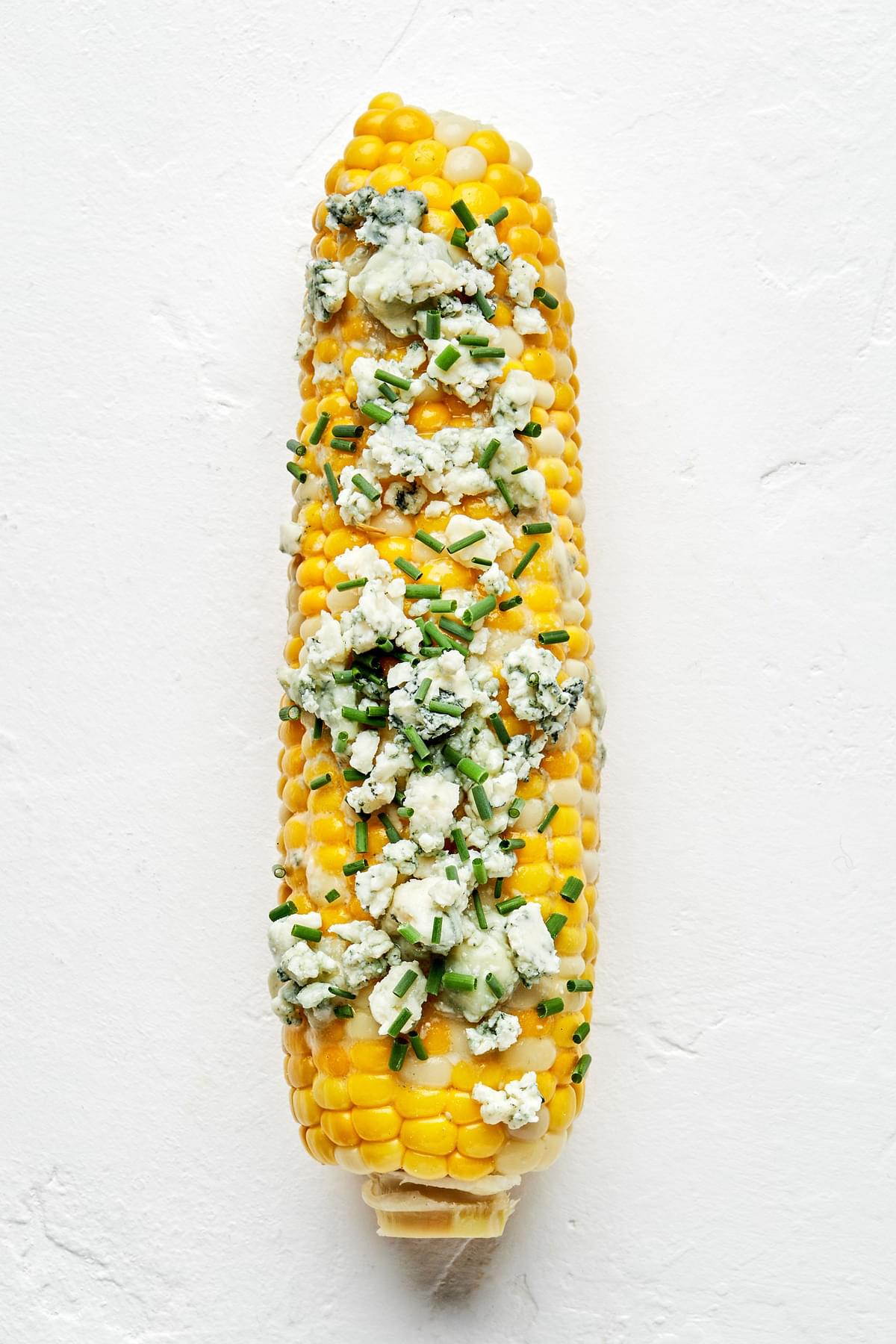 a grilled corn on the cob with Blue Cheese Butter and Chives