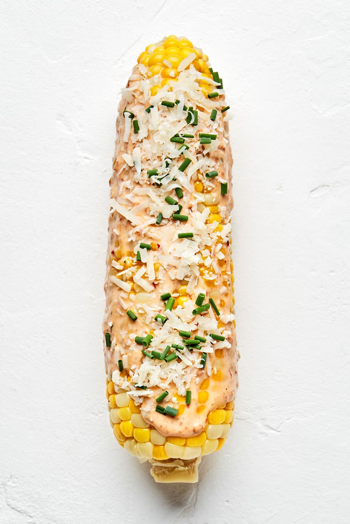 1 grilled corn on the cob with Chipotle Mayo, Parmesan Cheese and minced cilantro