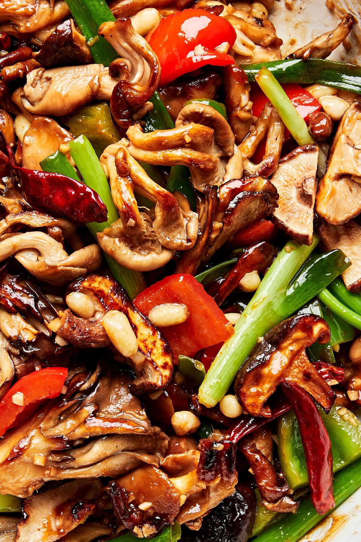 kung pao mushrooms with bell peppers, green onions and peanuts