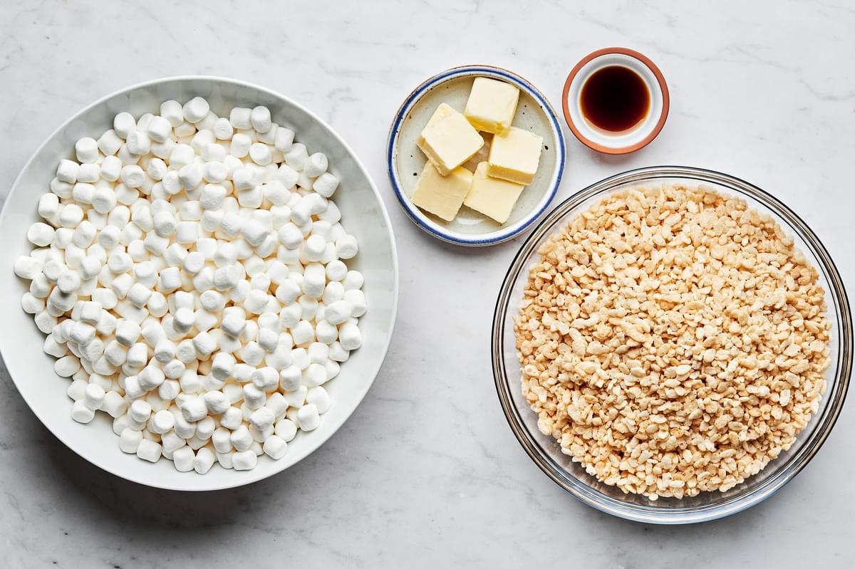 butter, vanilla, marshmallow and rice krispie cereal in prep bowls to make rice crispy treats