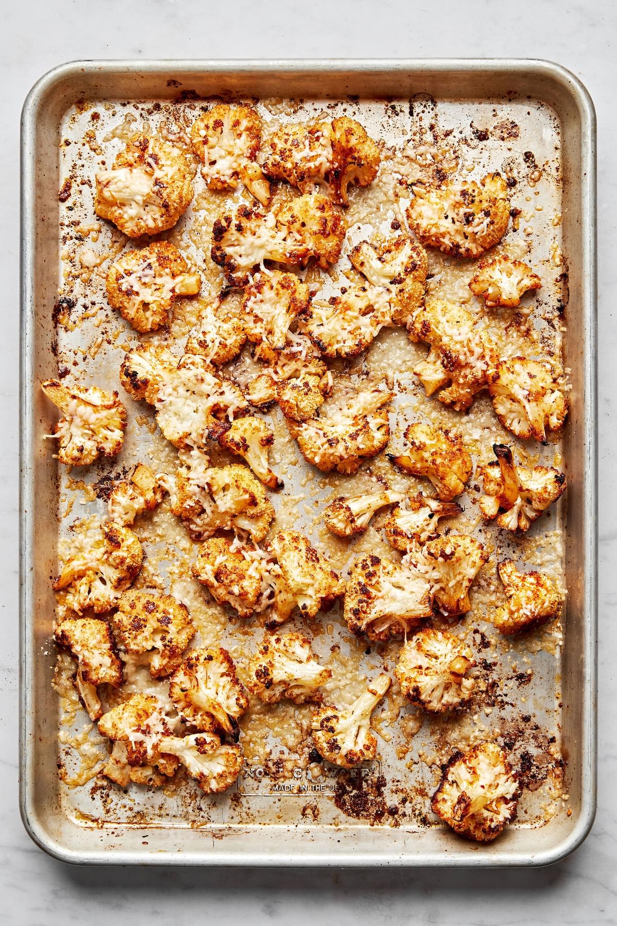 roasted cauliflower florets seasoned with salt, garlic powder, smoked paprika & red pepper flakes sprinkled with parmesan