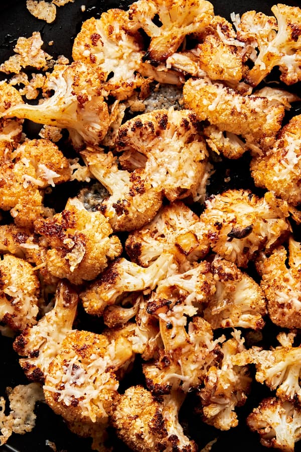 roasted cauliflower seasoned with olive oil, salt, garlic powder, smoked paprika, red pepper flakes, and grated Parmesan