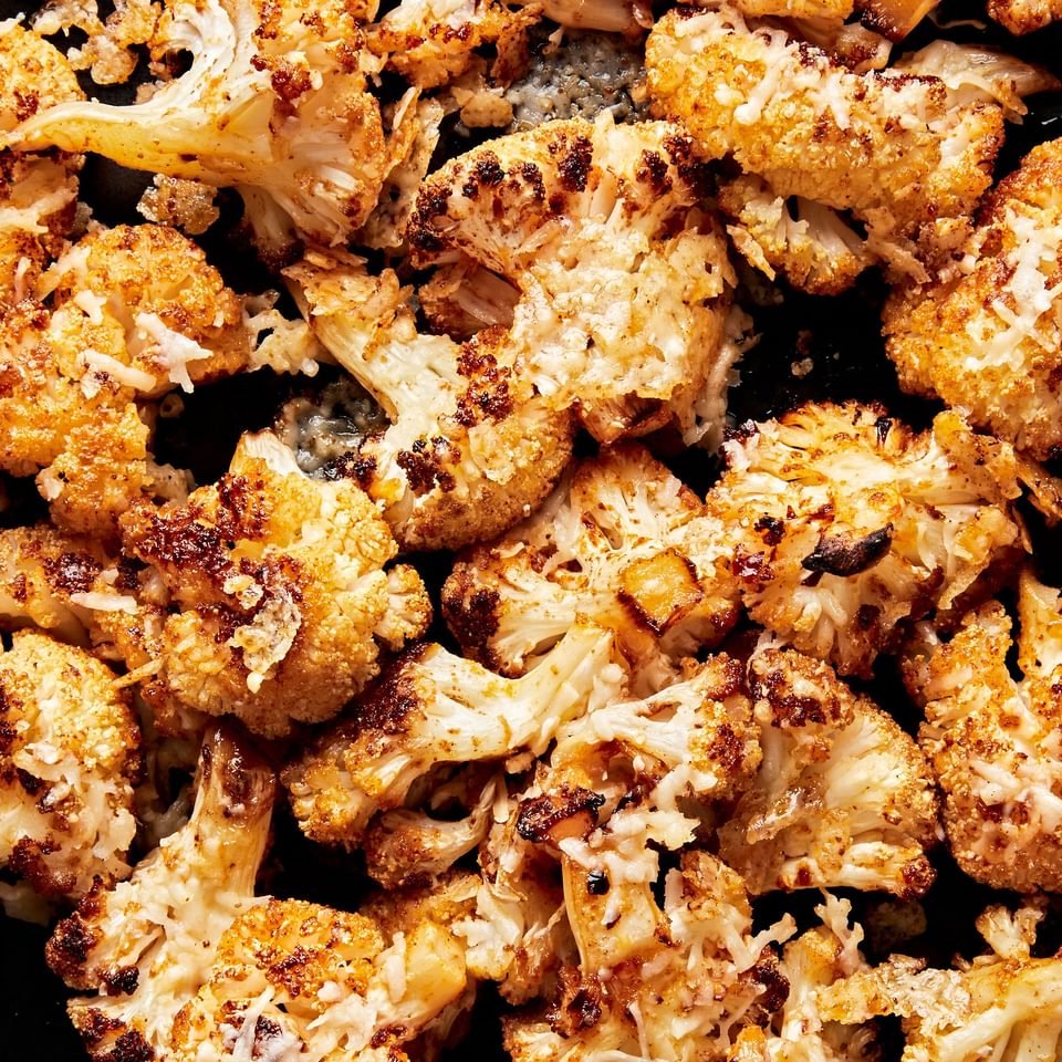 roasted cauliflower seasoned with olive oil, salt, garlic powder, smoked paprika, red pepper flakes, and grated Parmesan