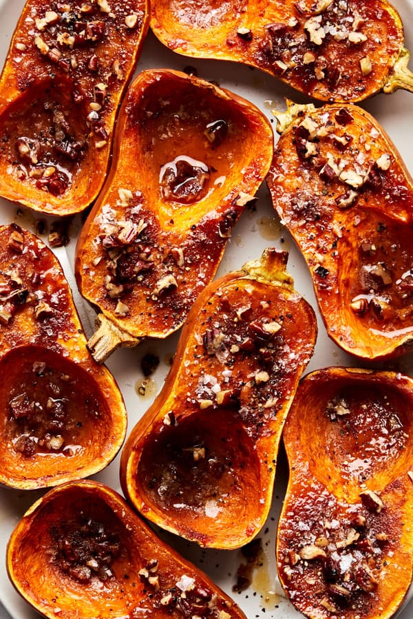 roasted honeynut squash seasoned with butter, brown sugar, salt, cinnamon and cayenne topped with pecans and black pepper