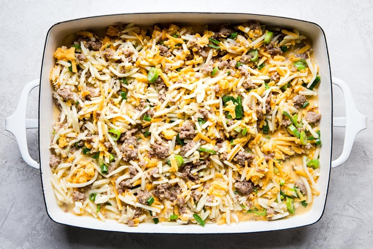sausage breakfast casserole with hash browns in a baking dish
