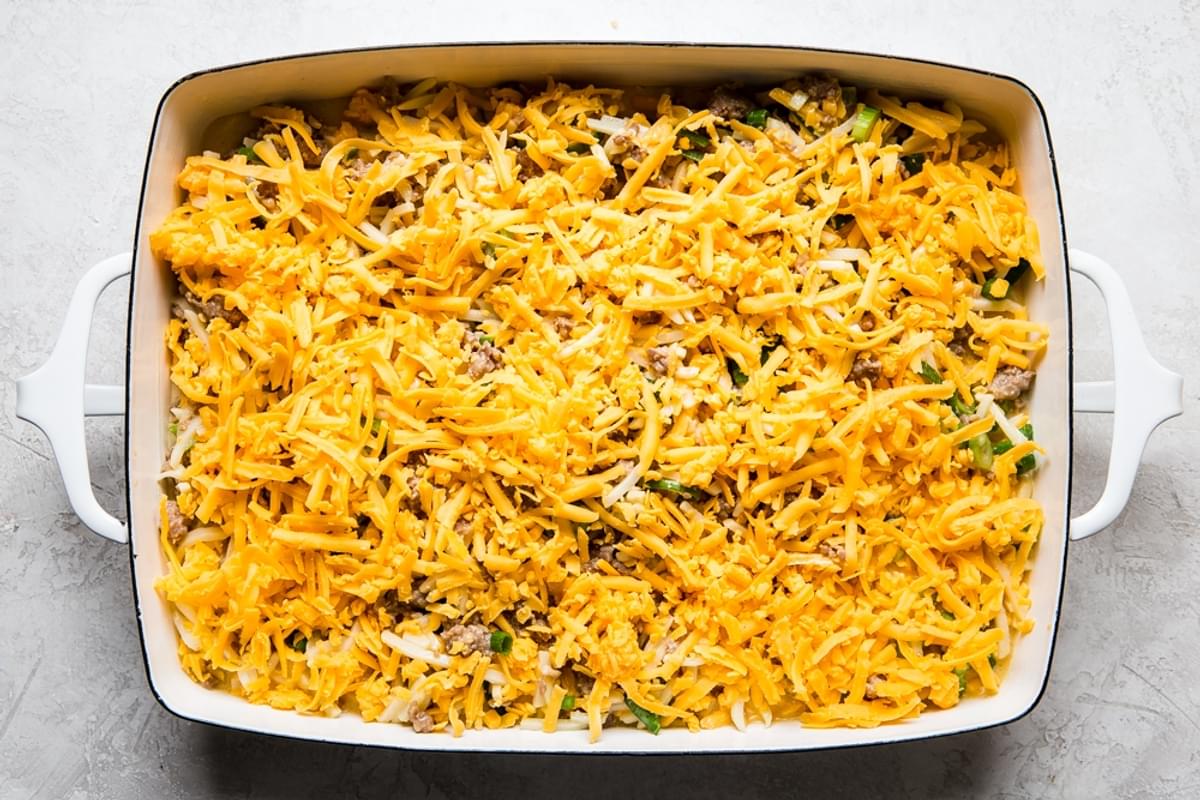 uncooked sausage breakfast casserole in a baking dish
