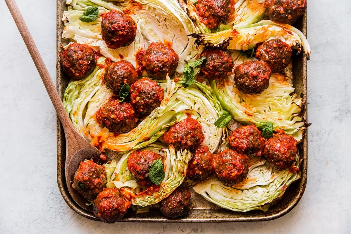 Sheet pan Meatballs with Cabbage and Harissa
