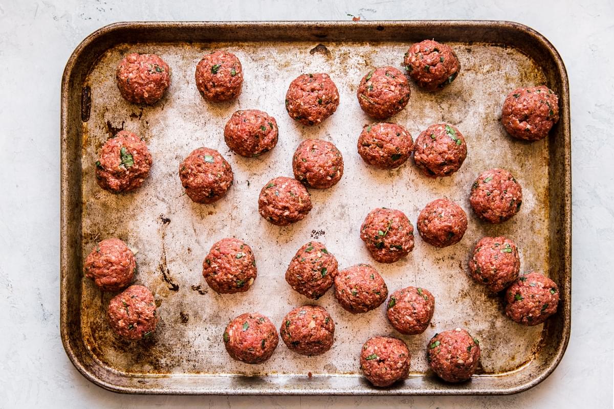 harissa meatballs on a baking sheet