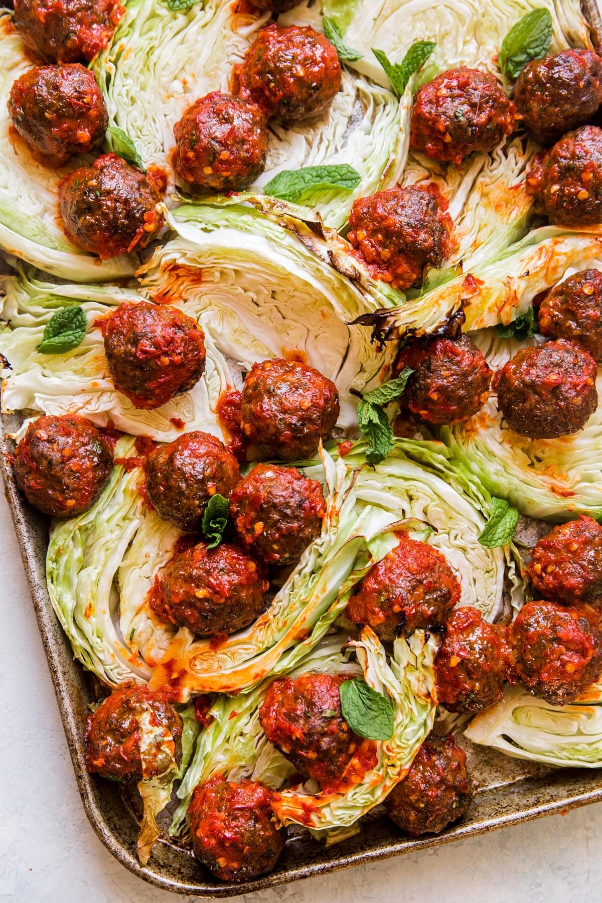 Sheetpan Meatballs with Cabbage and Harissa