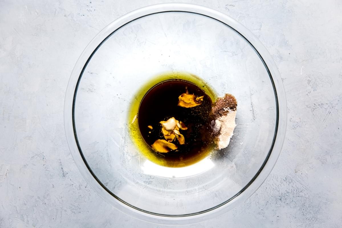 mustard, olive oil and Worcestershire sauce in a small glass bowl