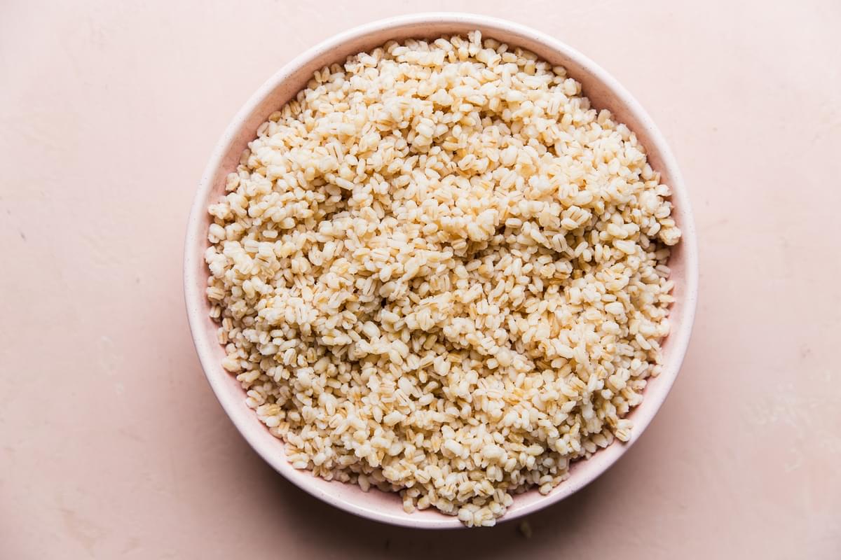 a bowl of cooked barley grain