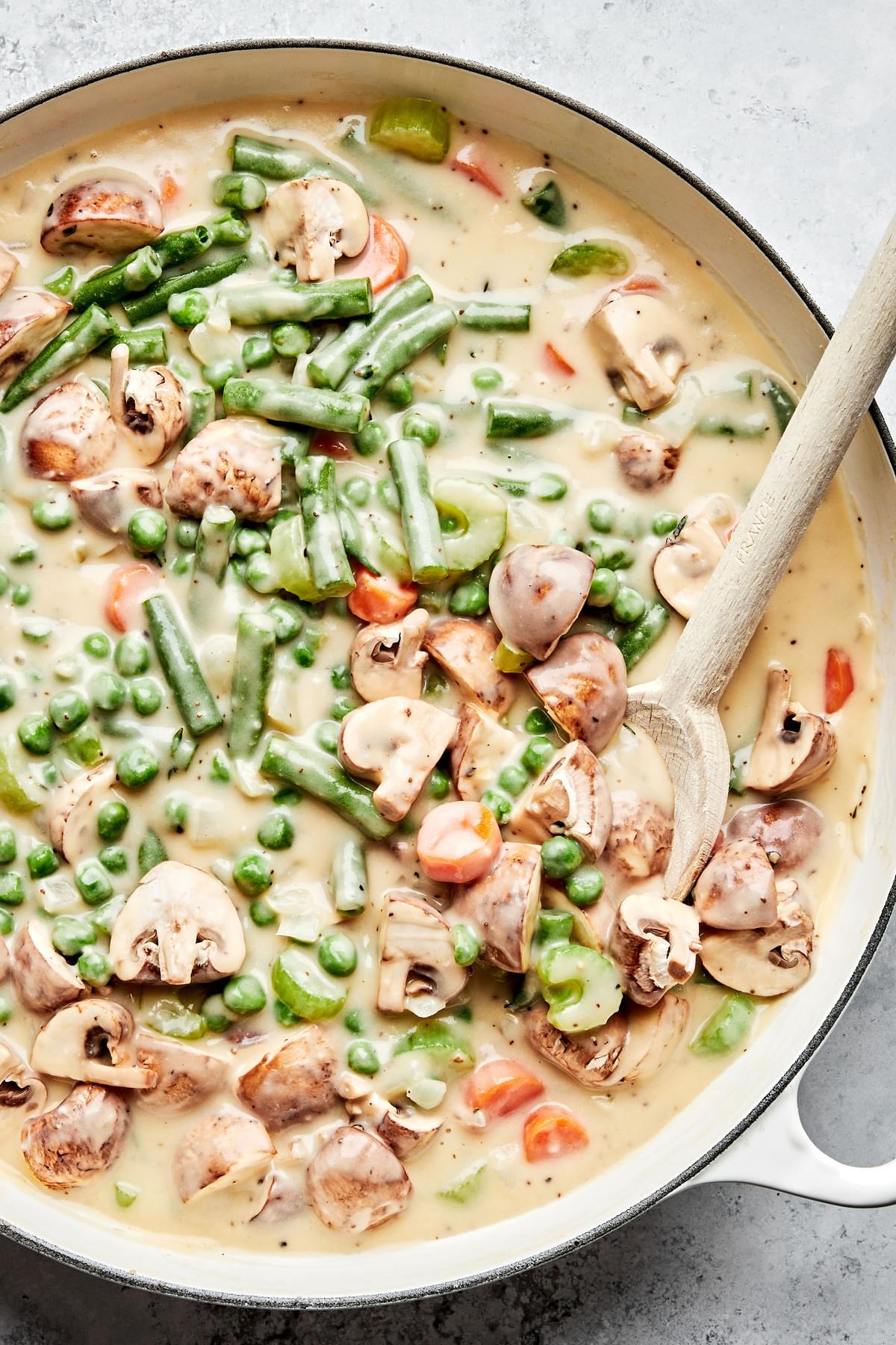 vegetable pot pie filling made with green beans, mushrooms and peas