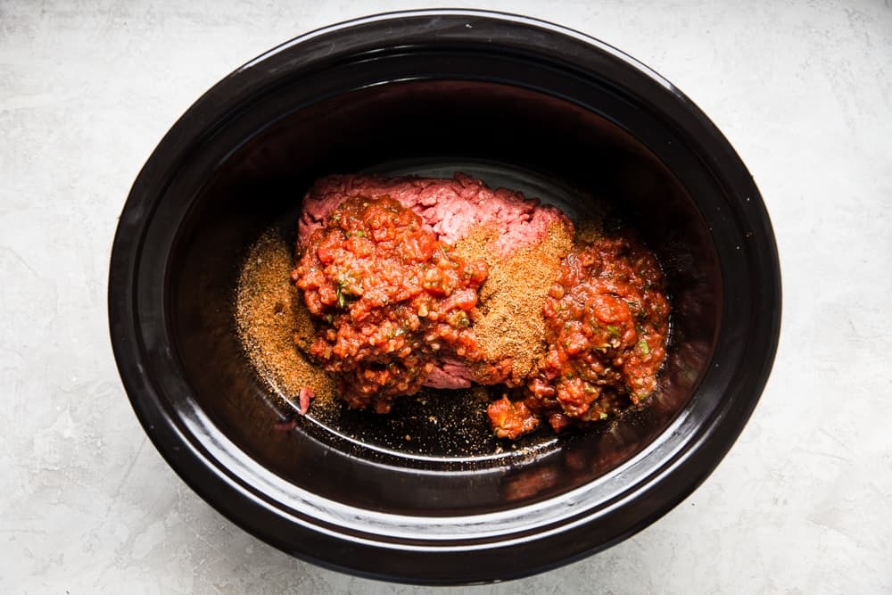 ground beef, salsa and taco seasoning in a crock-pot