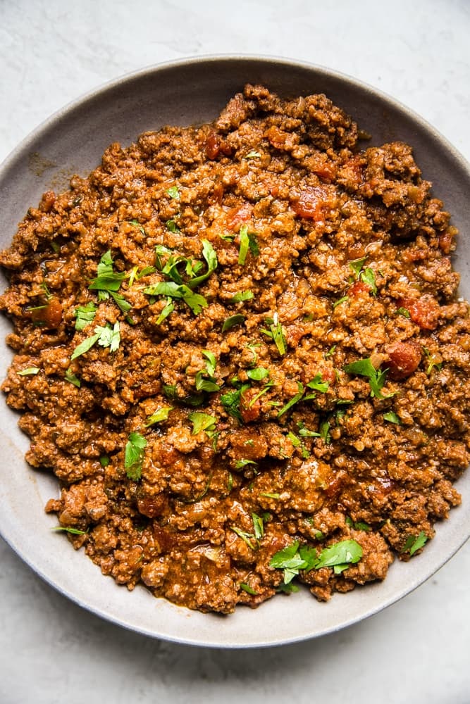 ground beef taco meat in a bowl made in the crock pot