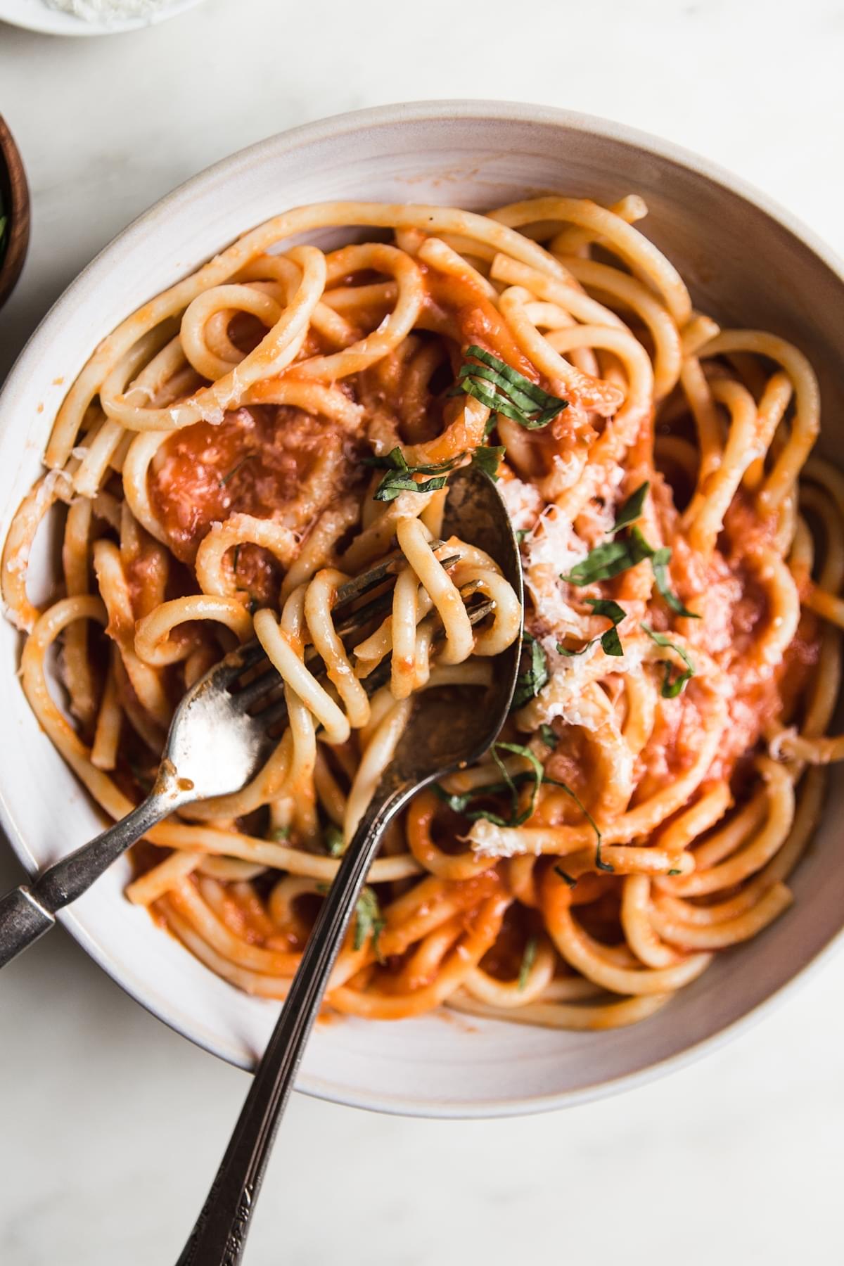 Three ingredient tomato sauce in a bowl with a fork