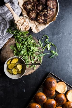 Beef patties, sun-dried tomato aioli, arugula, sweet and spicy pickles and brioche slider buns.