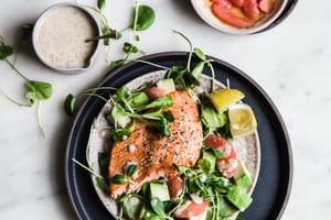 salmon and grapefruit salad with honey mustard dressing styled on a plate