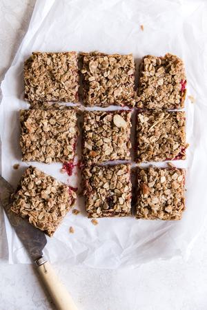 Raspberry Oatmeal Breakfast Bars cut into 9 pieces