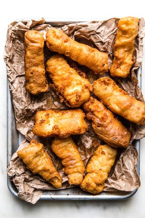 Beer-Battered Fish on parchment paper